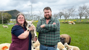 Grant Ireland and wife Nikki with one of their Beltex lambs