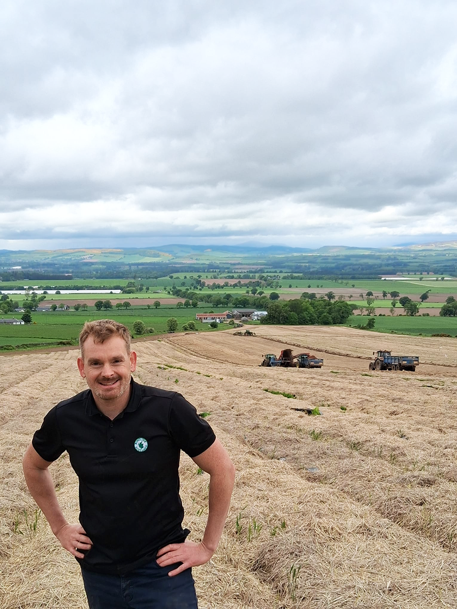 Ryan Dorsie at carrot harvesting